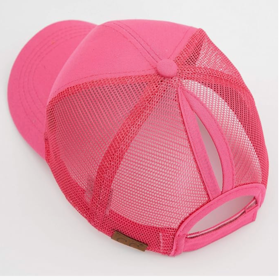 Pink mesh cap on a white background