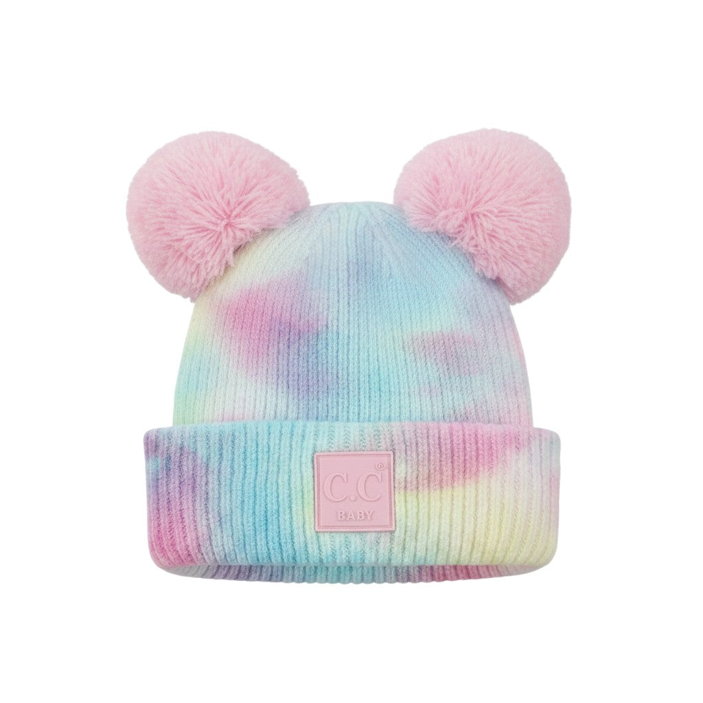 Truly Contagious baby beanie hat with pink pom poms and pastel tie-dye pattern. Made of viscose, polyester, and nylon.