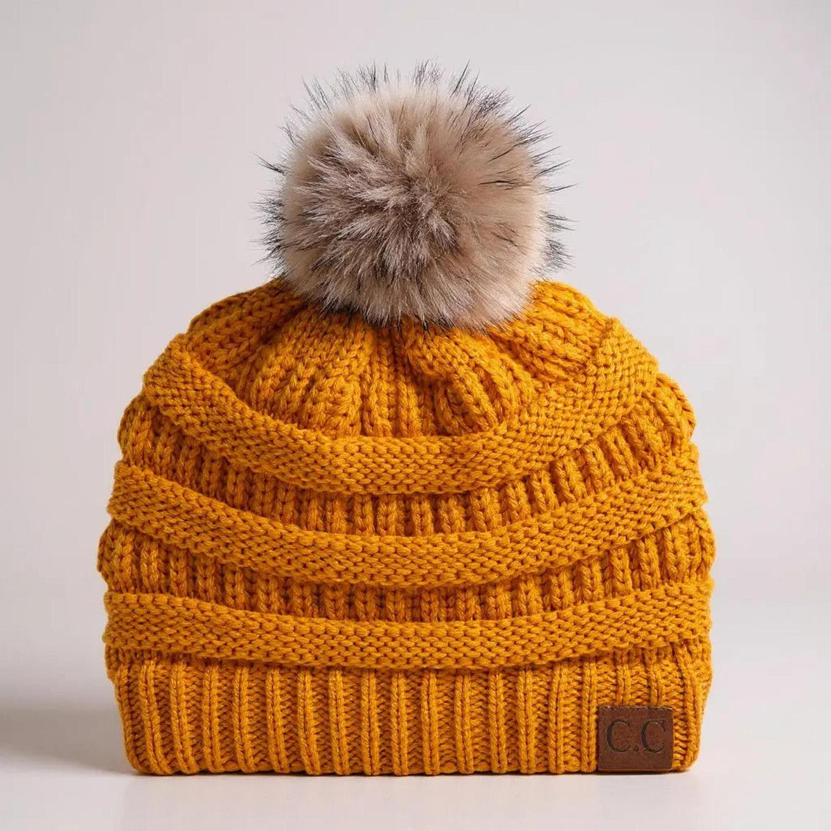 C.C® Trending Cable - Knit Tan Pom Beanie - Unisex Soft Acrylic Winter Hat, One Size - Truly Contagious
