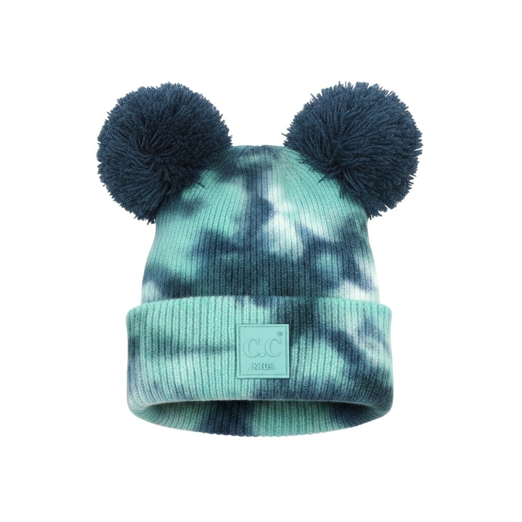 Truly Contagious baby beanie with teal and navy tie-dye pattern and two navy blue pom poms. Ribbed knit with faux leather C.C. Kids patch.